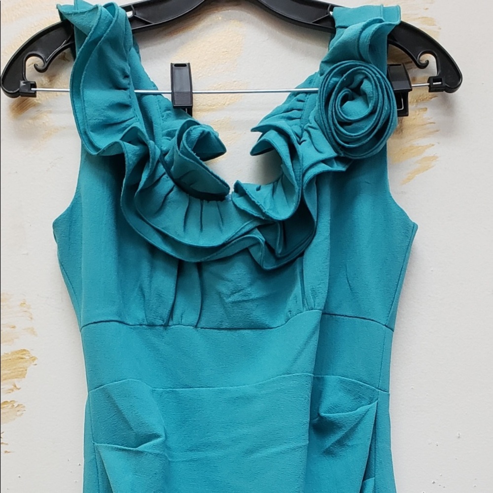 Turquoise poly-crepe frill top and pleated balloon bottom dress